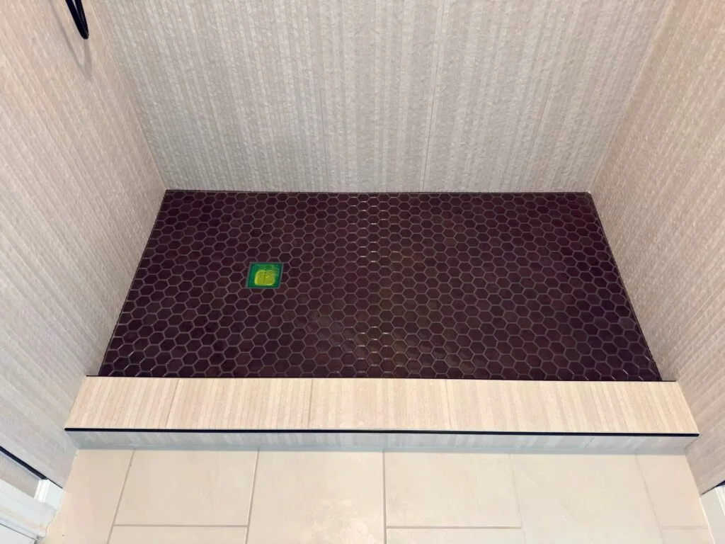Crescentwood bathroom shower niche and tilework