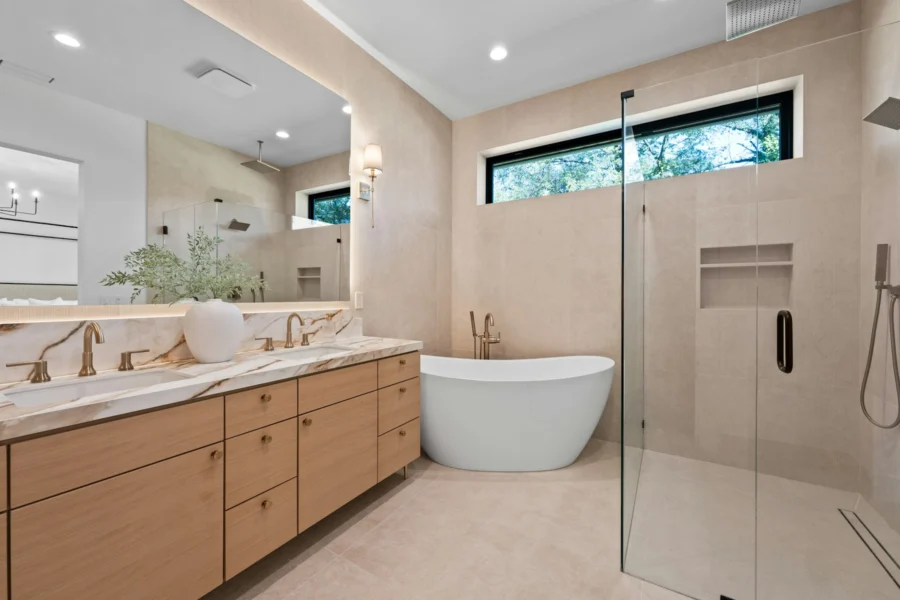 Premium modern bathroom with freestanding tub, double vanity and glass walk-in shower